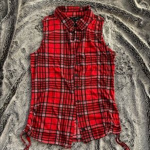 Red plaid/flannel full button up sleeveless shirt with tie details.